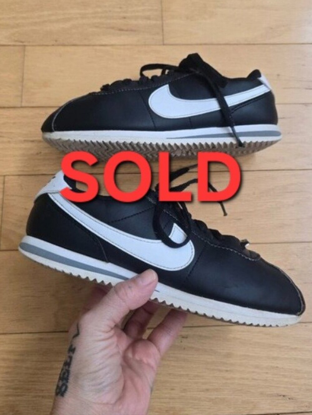 Nike | Cortez Classic black leather sporty retro sneakers | KIDS 2.5